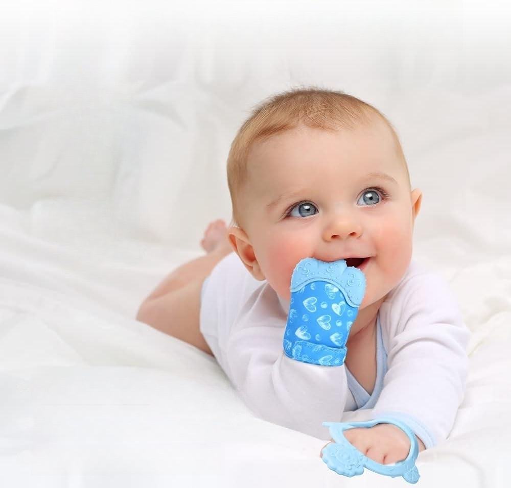 Mitaines de dentition pour bébé Mitaine de soulagement de la douleur  auto-apaisante, jouet de dentition stimulant, gant de protection contre les  rayures avec sac de voyage, reste sur la main de bébé